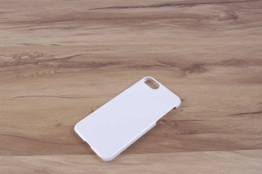 Ahşap arka plan akıllı telefon için durum