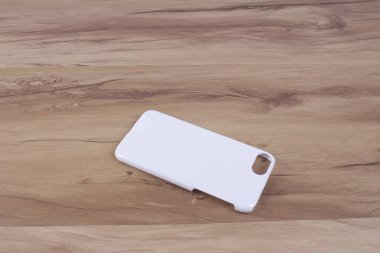 Ahşap arka plan akıllı telefon için durum