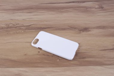 Ahşap arka plan akıllı telefon için durum