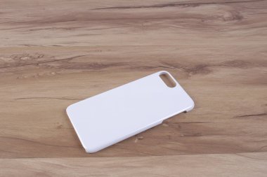 Ahşap arka plan akıllı telefon için durum