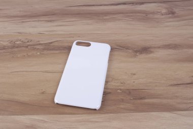 Ahşap arka plan akıllı telefon için durum