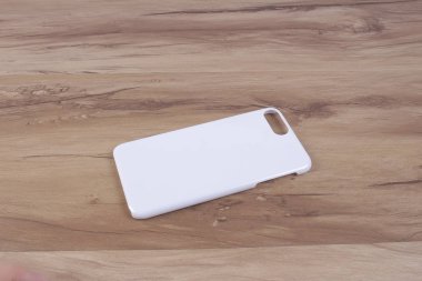 Ahşap arka plan akıllı telefon için durum