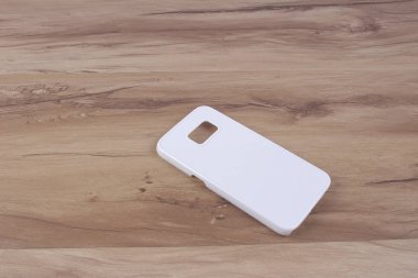 Ahşap arka plan akıllı telefon için durum