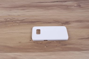 Ahşap arka plan akıllı telefon için durum