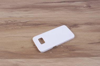 Ahşap arka plan akıllı telefon için durum