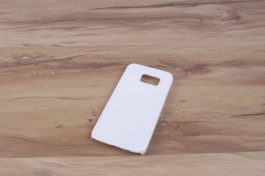 Ahşap arka plan akıllı telefon için durum