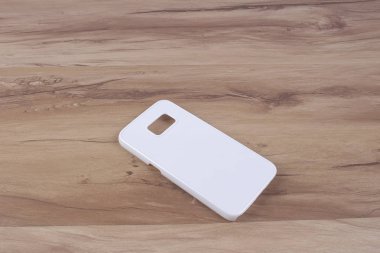 Ahşap arka plan akıllı telefon için durum