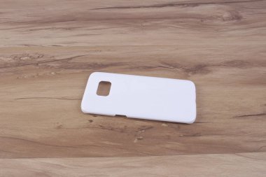 Ahşap arka plan akıllı telefon için durum