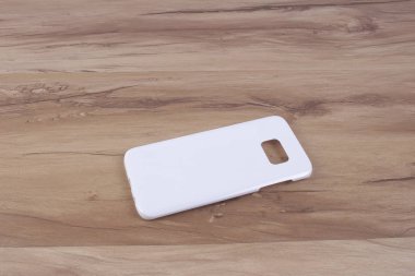 Ahşap arka plan akıllı telefon için durum