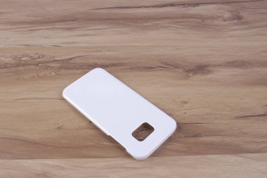 Ahşap arka plan akıllı telefon için durum