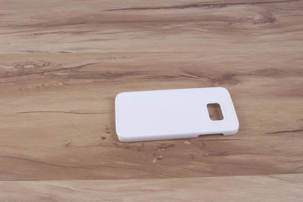 Custodia per smartphone su sfondo in legno — Foto Stock