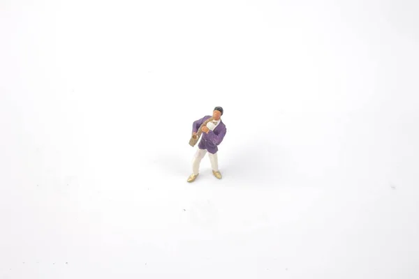 Figura saxofonista del mundo en miniatura — Foto de Stock