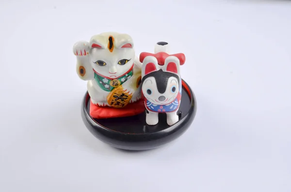 Den manekineko och inuhariko isolerade — Stockfoto