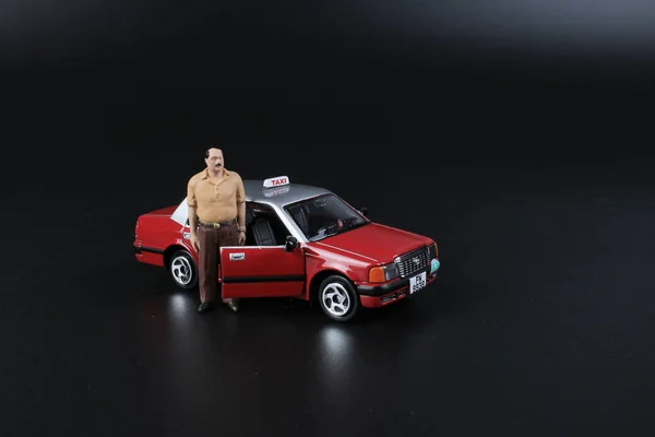 the toys of taxi and driver