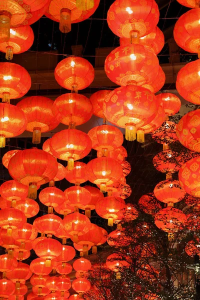 Red lamp hanging on ceiling — Stock Photo, Image