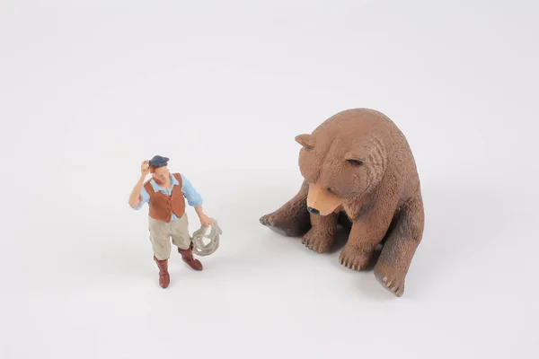 the mini figures catching bear