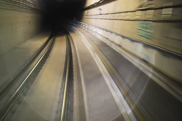Riding train through subway tunnel — Stock Photo, Image