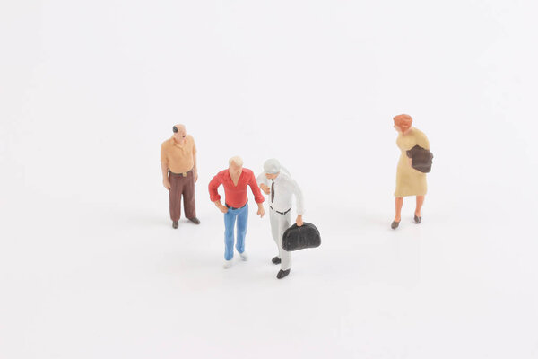 Miniature people on the board