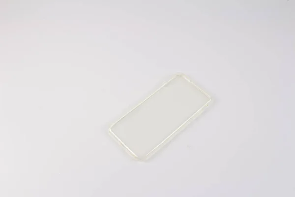 Étui en plastique pour téléphone intelligent sur fond blanc — Photo