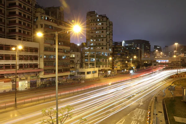 Light trails through the footbridge,hongkong — Stock Photo, Image