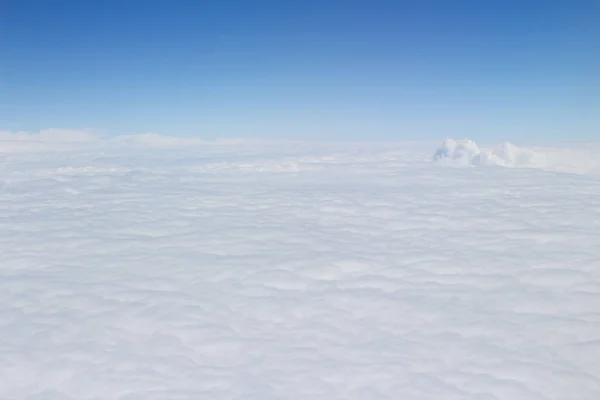 Blue sky high view from airplane clouds shapes — Stock Photo, Image