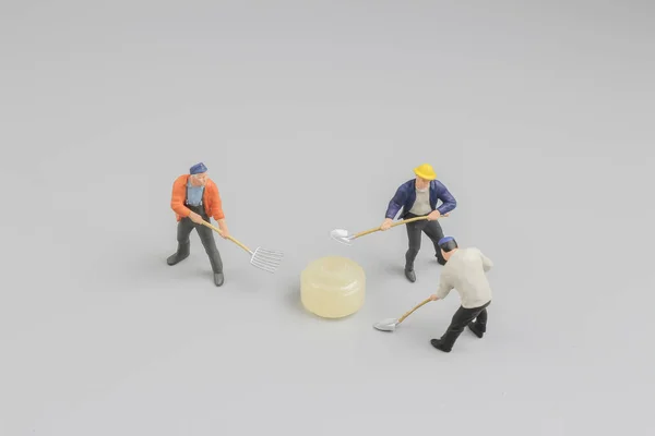 Mini of painters of workers with candy — Stock Photo, Image