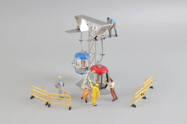 Mini figure with cable car at the site — Stock Photo, Image