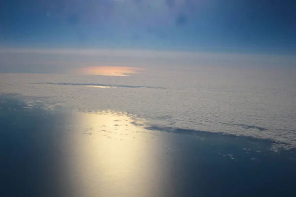 View above the earth at the clouds below — Stock Photo, Image