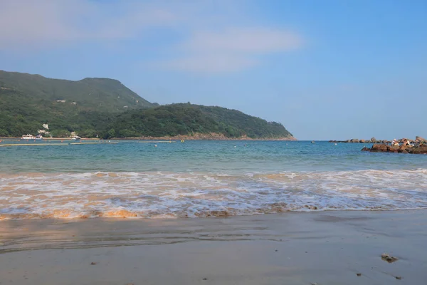 Homokos strand, a tiszta víz-öbölben, hk — Stock Fotó