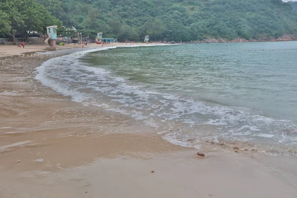 Sandy beach at clear water bay — Stock Photo, Image