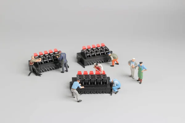 Mini Technicians working on fun setting — Stock Photo, Image