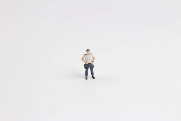 Szórakoztató Mini rendőr a fehér tábla — Stock Fotó