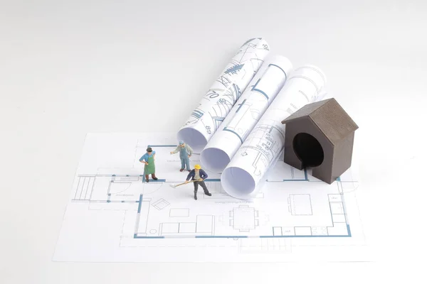 Hausbau auf Bauplänen Arbeiter Bauprojekt — Stockfoto