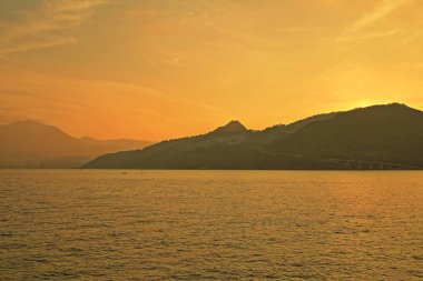 Önemsiz yuva, Tseung Kwan O yuva gün batımında