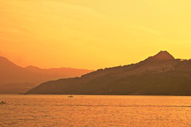 Önemsiz yuva, Tseung Kwan O yuva gün batımında