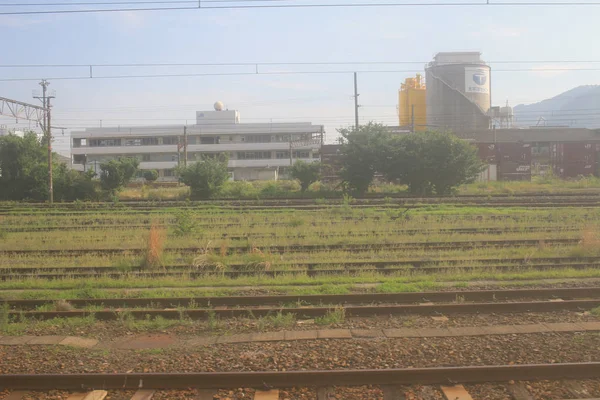 Vista do comboio da cidade do japão — Fotografia de Stock