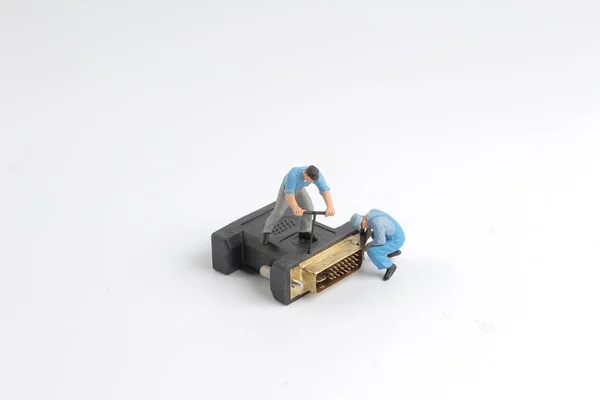 Little workers are repairing the vga head — Stock Photo, Image