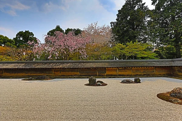 A Zen Rock Garden in Ryoanji Temple.In a garden fifteen stones o