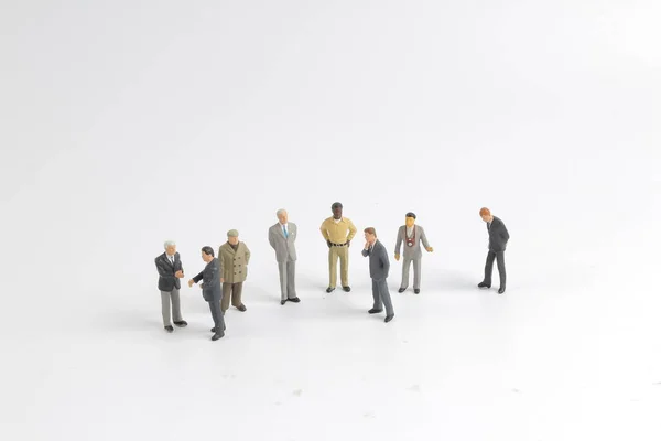 Mini grupo modelo de investidor em pé juntos — Fotografia de Stock