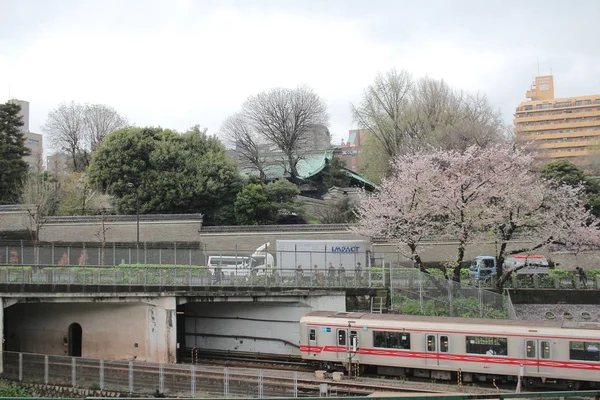 Trains pass over the Kanda Rive — Stock Photo, Image