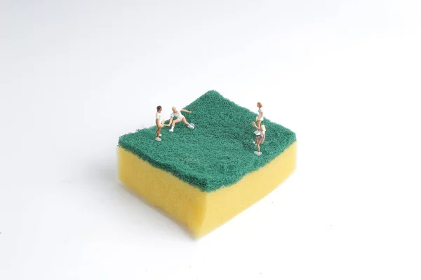 Tiny of toys play tennis on Sponge — Stock Photo, Image