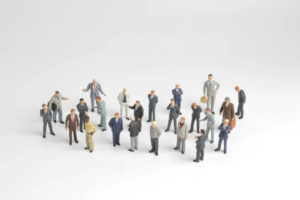 Mini grupo modelo de inversores de pie juntos aislados — Foto de Stock