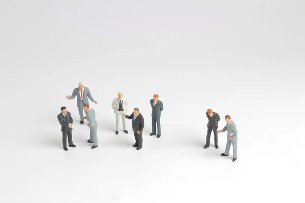 mini model group of investor standing together isolated