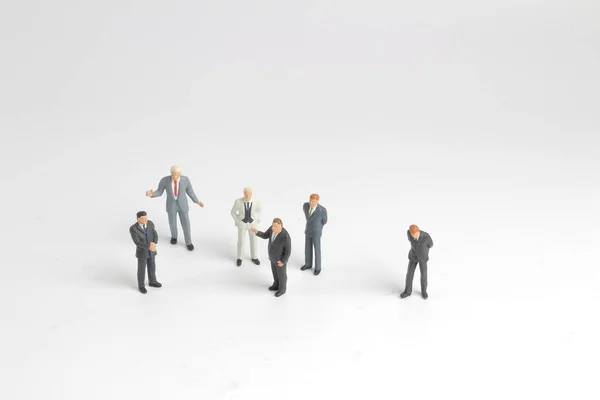 mini model group of investor standing together isolated