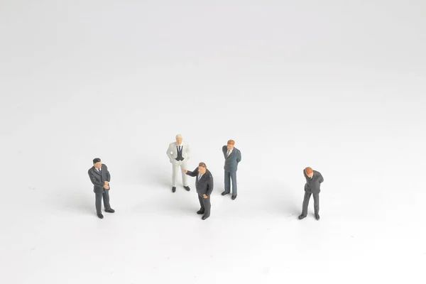 mini model group of investor standing together isolated