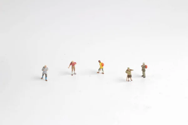 Little toys with model mountain. Close up photo. — Stock Photo, Image