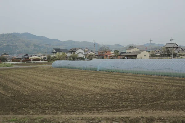 Uitzicht op het platteland met de trein — Stockfoto