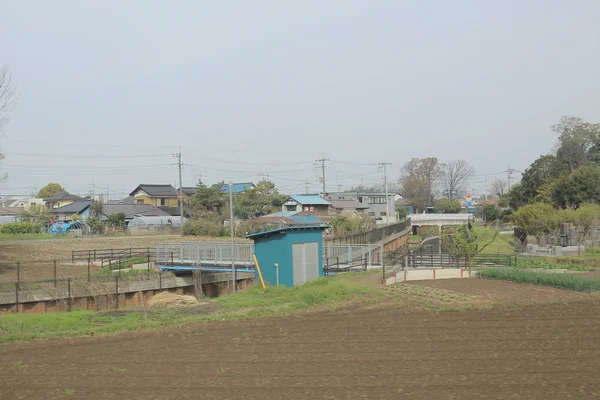 Vue de campagne côte à côte par fenêtre au train — Photo