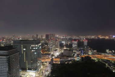 Dünya Ticaret Merkezi'nden görüldüğü gibi Güney Tokyo siluetinin