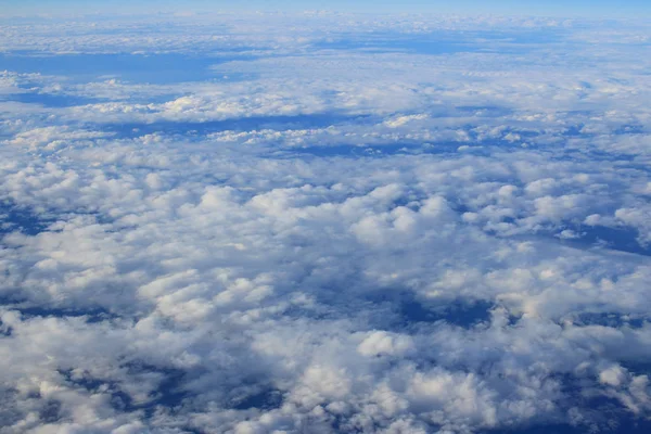 Aerial view fo city through airplane window — Stock Photo, Image
